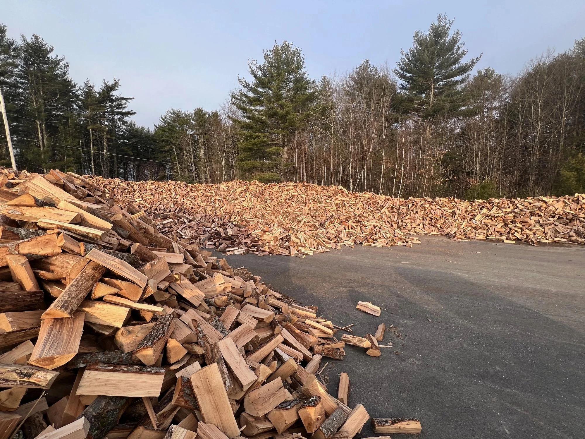 A stacked pile of split, seasoned firewood