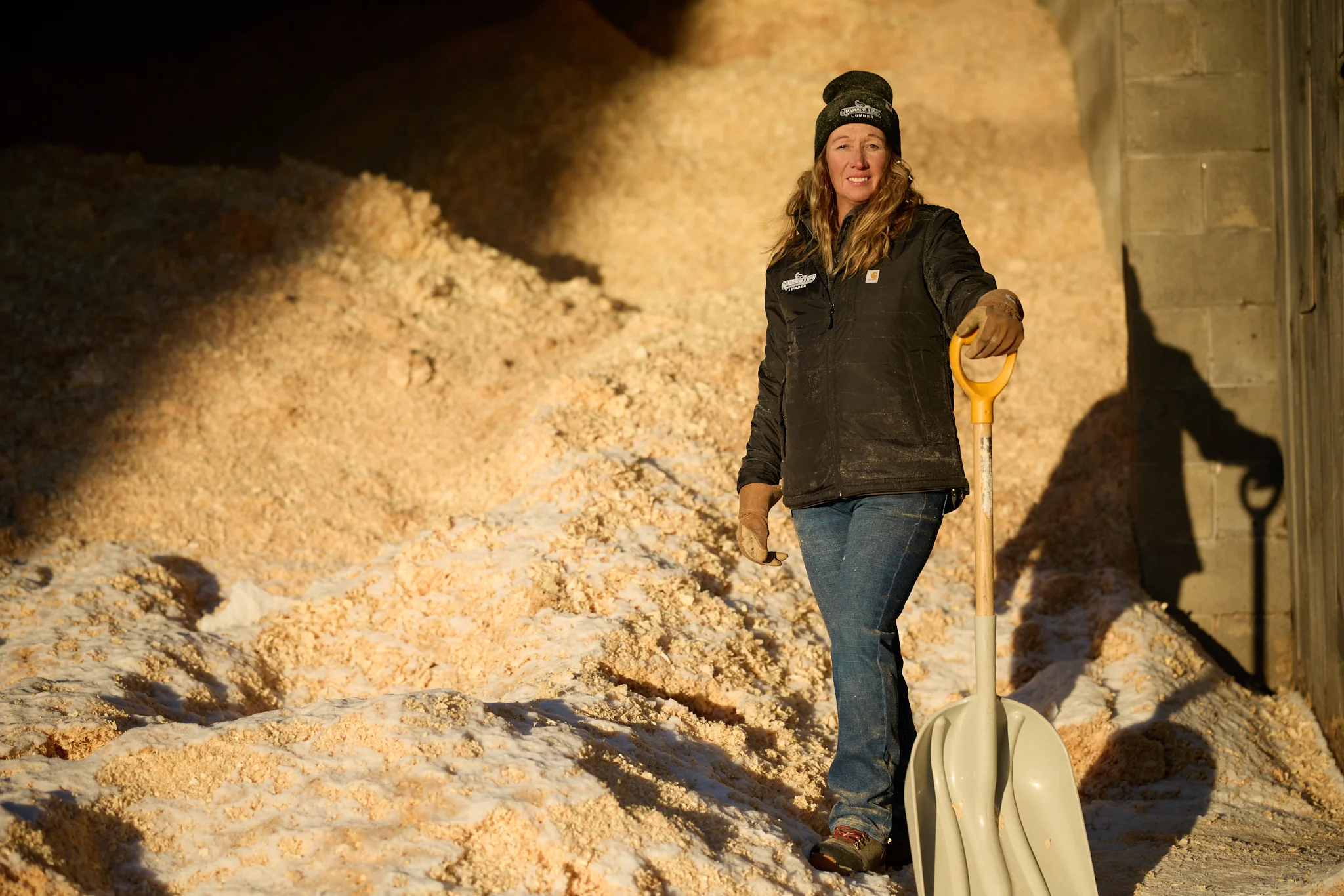 A large pile of sawdust landscaping mulch at the yard
